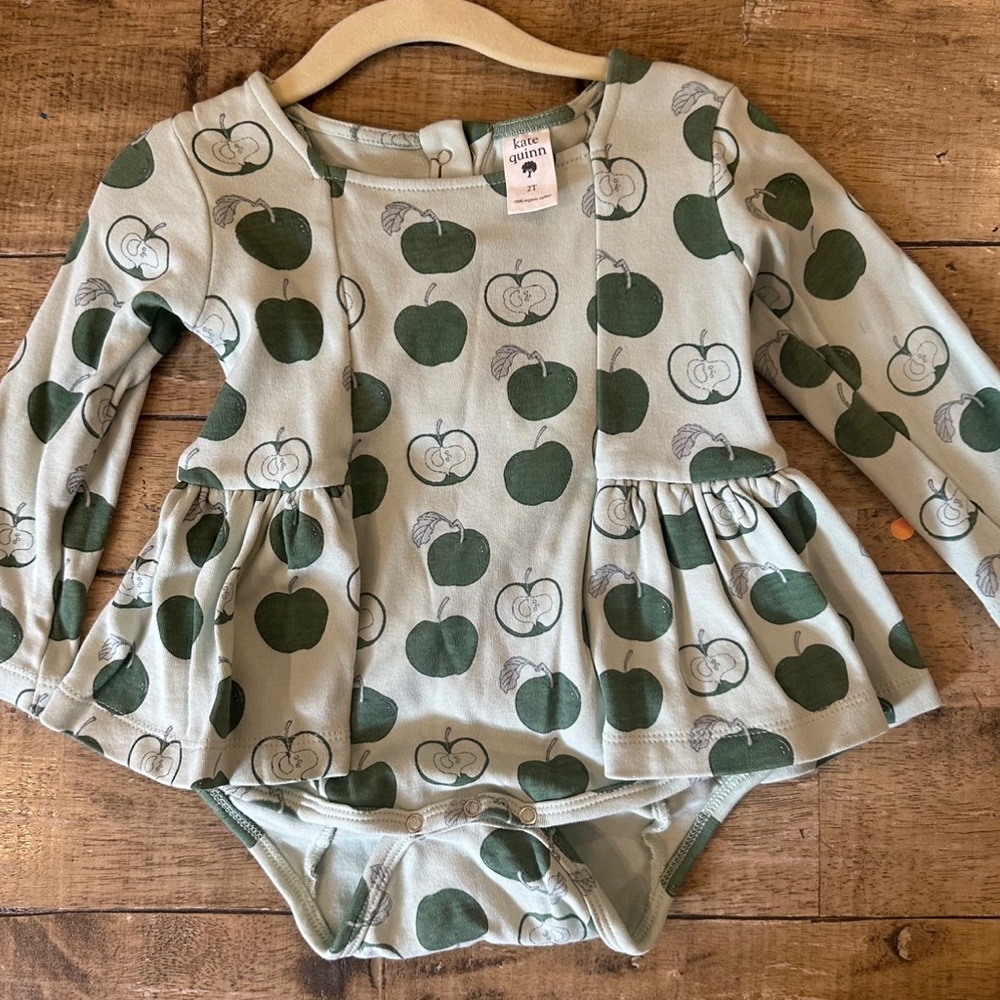 Kate Quinn Green Bodysuit with Peplum Detail